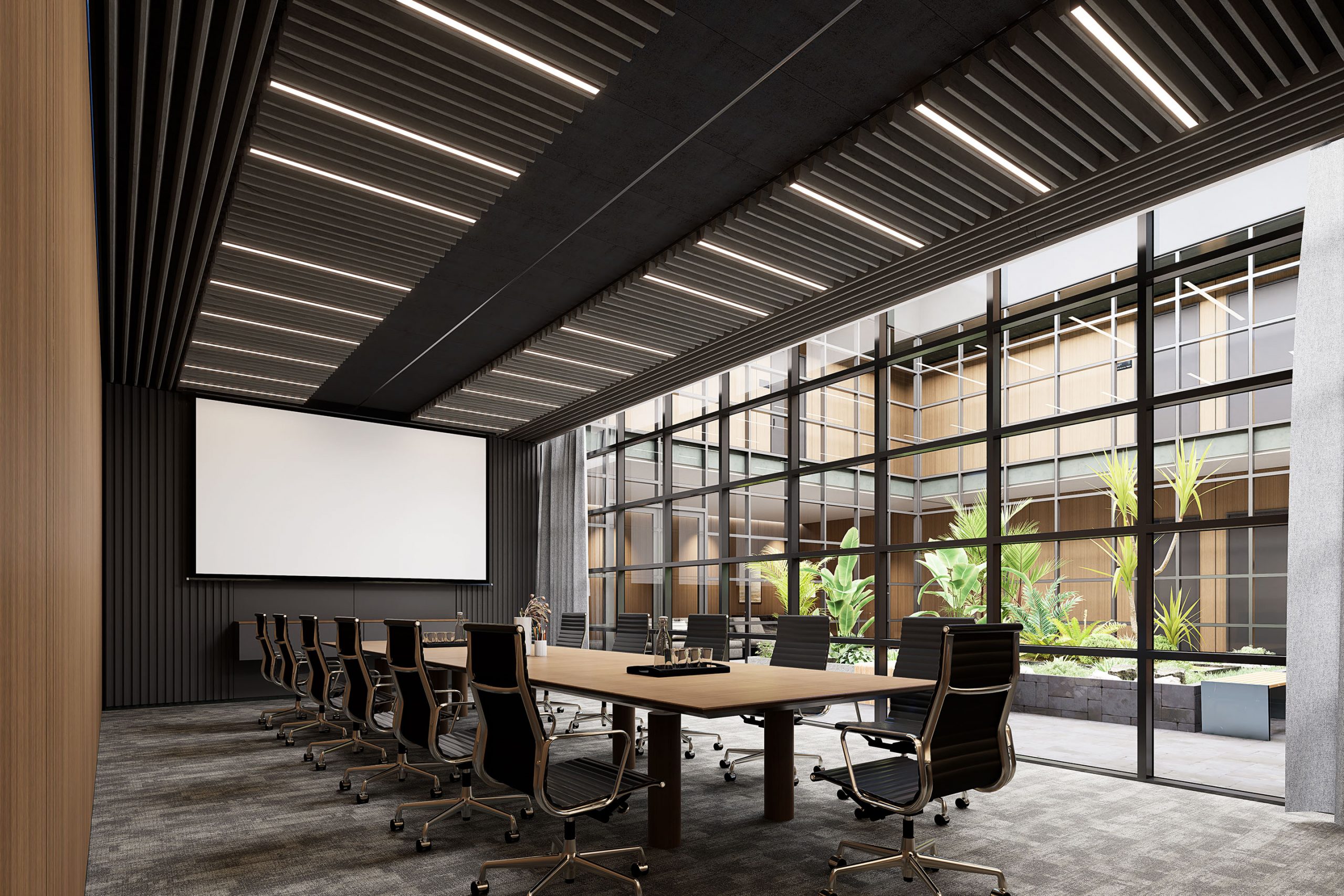 A modern conference room with a long wooden table surrounded by black office chairs. One side features floor-to-ceiling windows overlooking a courtyard with greenery. The ceiling, enhanced by an acoustic felt frame, has recessed lighting, and there is a large projector screen at one end of the room.
