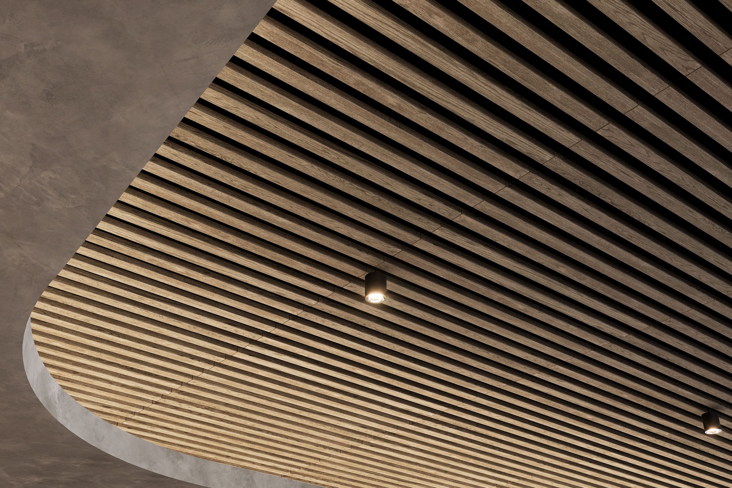 A modern ceiling featuring two recessed spotlights, framed by an acoustic felt ceiling. The ceiling has rounded edges and a smooth, concrete-like finish on the sides, giving a sleek and contemporary appearance.