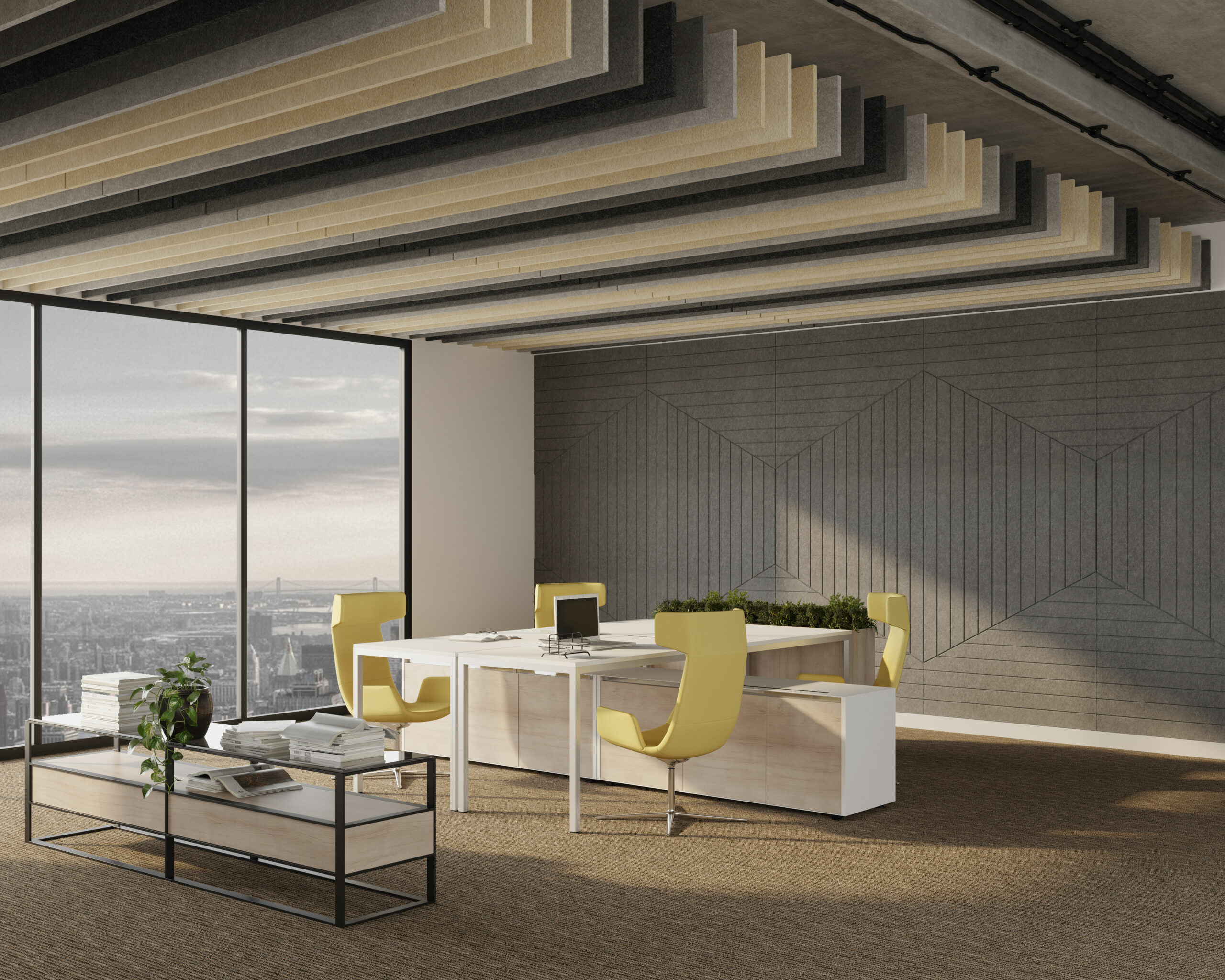Modern office space with large windows offering a city view. The area has a wooden desk with a computer and yellow chairs around it. A coffee table with documents and potted plants is in the foreground. The ceiling features hanging acoustic baffles, and the walls boast acoustic felt wall panels for added sound comfort.