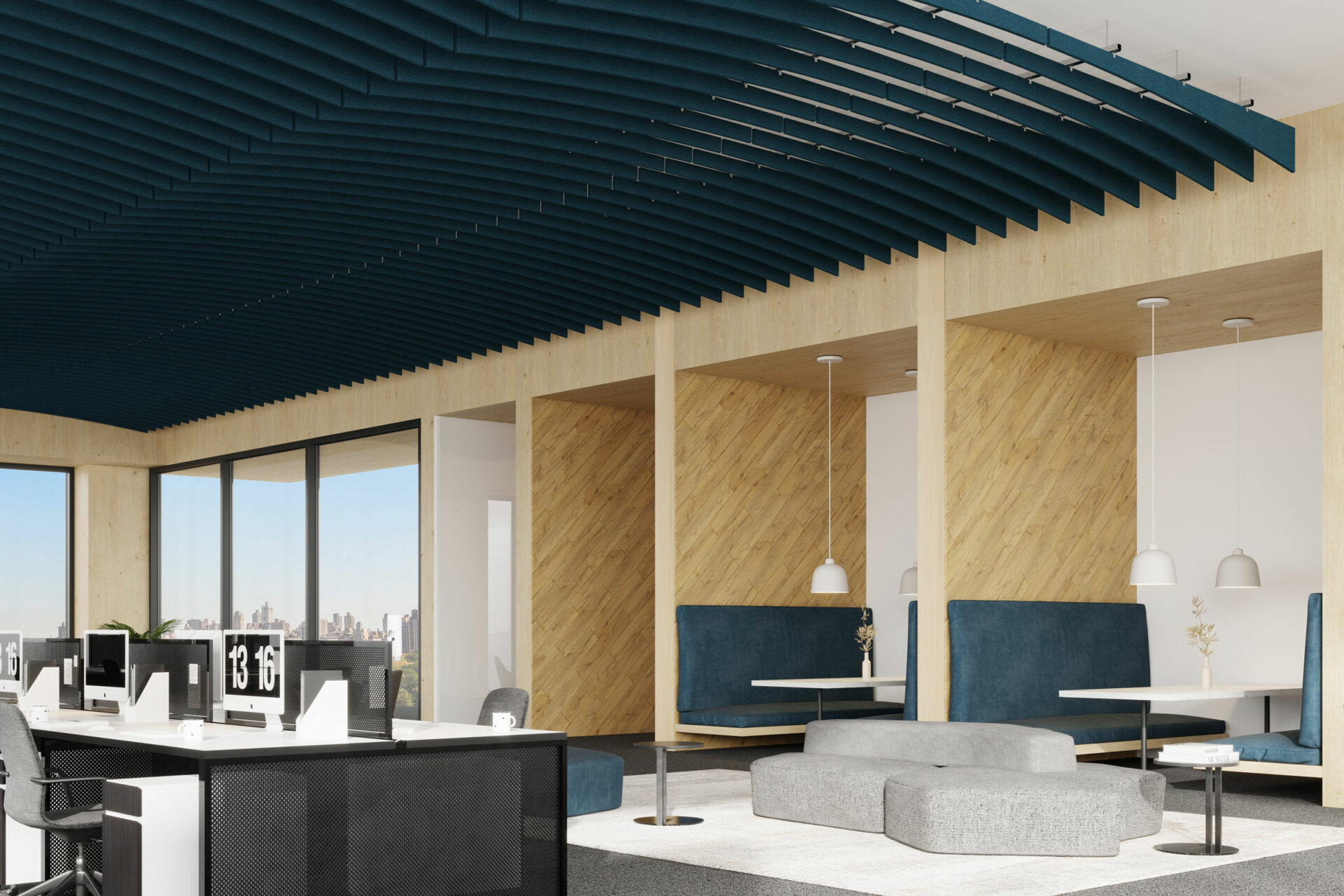 A modern open-plan office space featuring workstations with desktop computers, gray office chairs, and black and white desks. The background shows cozy booth seating with blue cushions, wooden paneling, and hanging white lamps. The ceiling's dark blue horizontal acoustic ceiling baffles add an electric touch to the room.