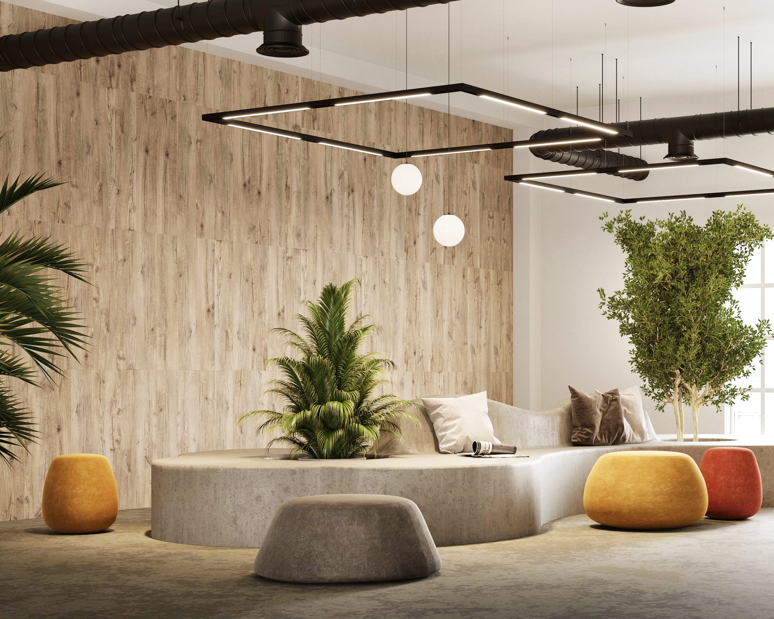 A modern, minimalist lounge features a curved concrete bench with green plants atop and beside it. Colorful poufs in yellow, orange, and gray add a pop of color. Overhead, geometric black light fixtures hang. The space is accented by acoustic felt wall planks along with large potted trees.