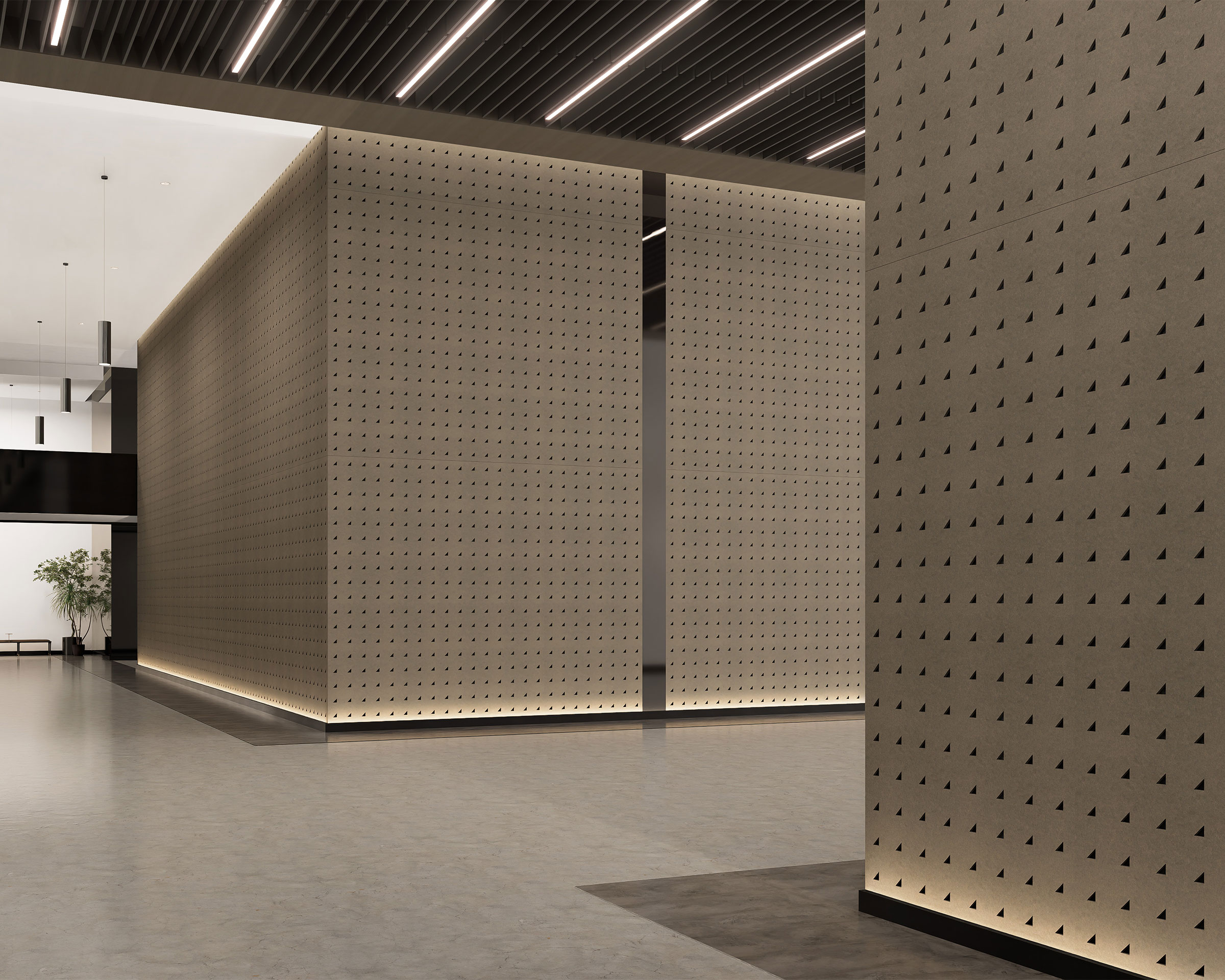 Modern interior with minimalist design featuring large, perforated beige right triangle acoustic felt wall panels, subdued lighting emphasizing clean lines, and a polished grey floor. A small tree in the far corner adds a touch of greenery to the space.