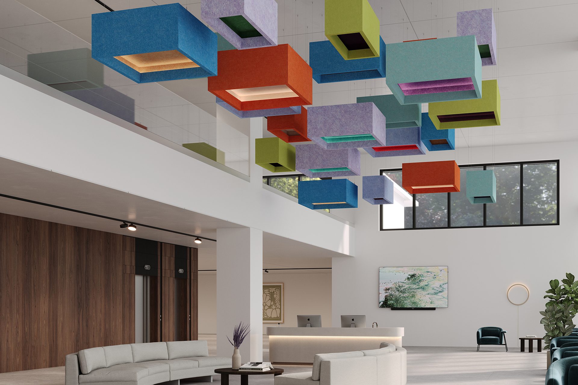 A modern office lobby features a double-height ceiling with colorful, cube-shaped acoustic felt clouds hanging from above. The space includes curved sofas, a round coffee table, a reception desk adorned with plants, and large windows allowing natural light to stream in.