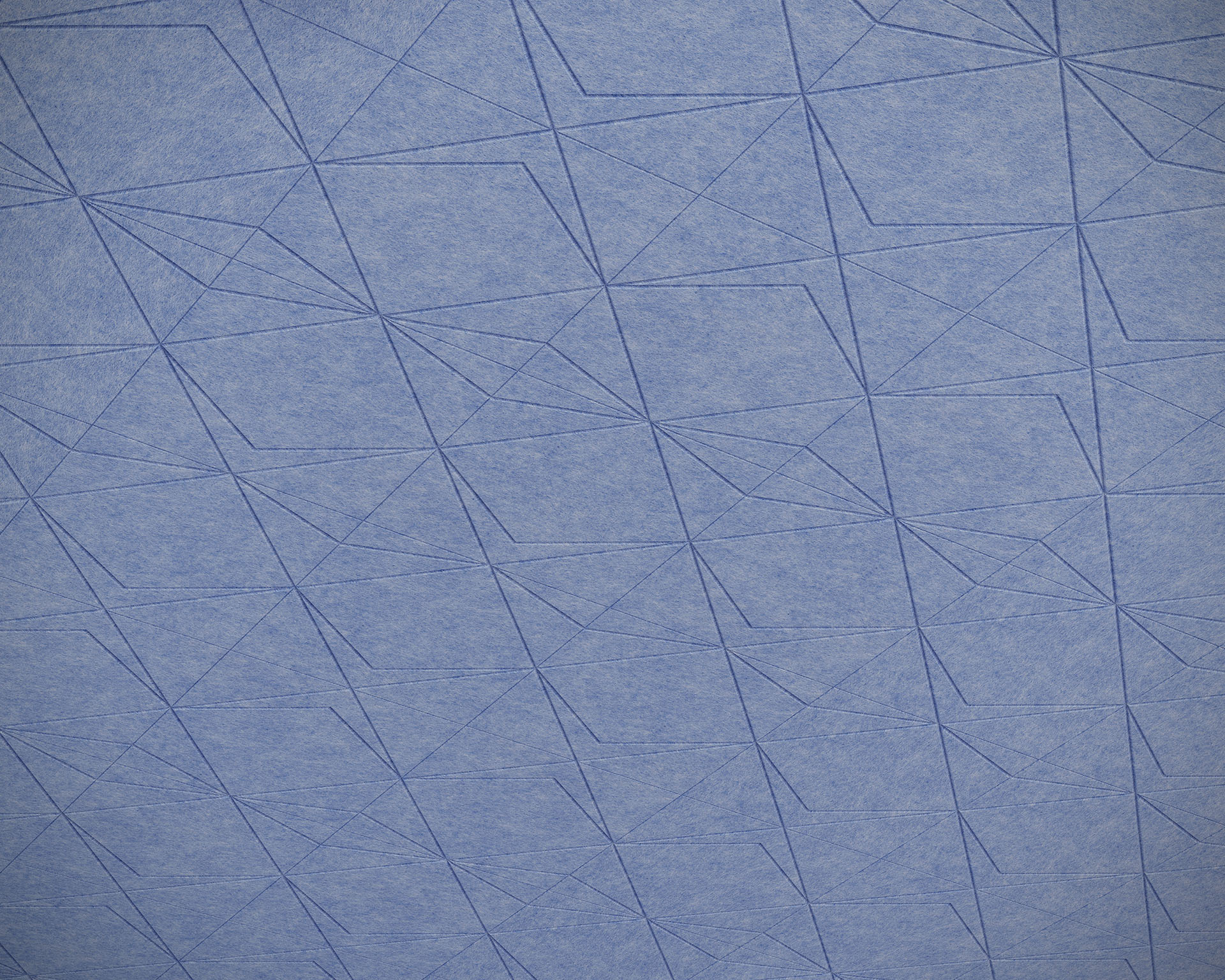 Close-up of a blue acoustic felt ceiling surface with intersecting geometric lines forming diamond shapes and triangles, reminiscent of keystone fracture patterns. The lines create overlapping, angled grids, giving a structured and textured appearance.
