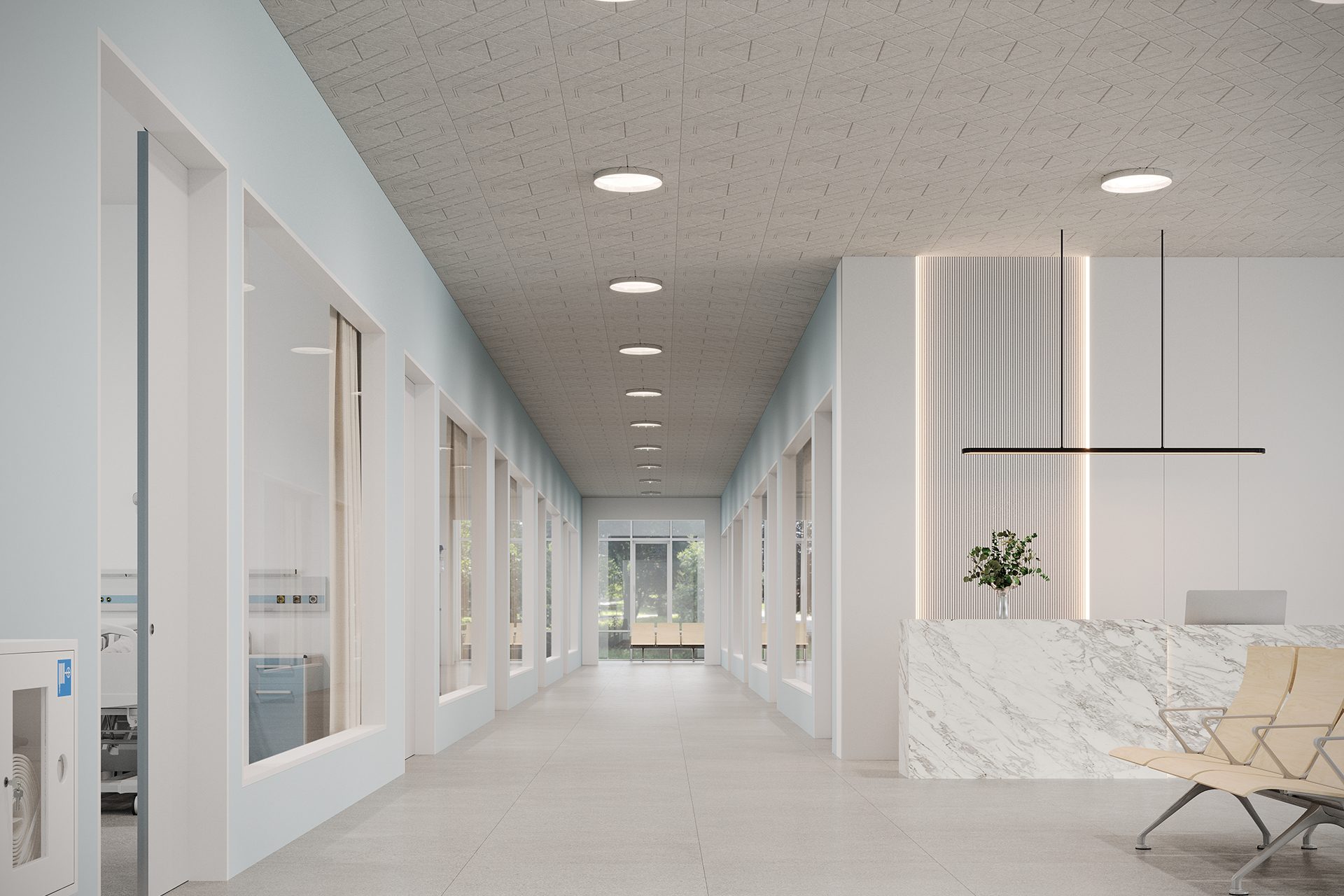 A modern, minimalist hallway with light blue walls and a white ceiling adorned with quilted fracture acoustic felt panels, featuring round recessed lights. To the right is a marble reception desk with a potted plant and wooden chairs nearby. Large glass windows line the opposite wall.