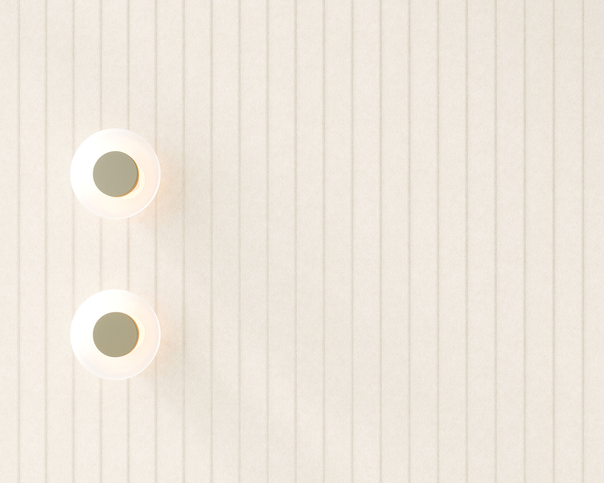Two round ceiling lights are mounted on a textured beige acoustic felt wall. The design features vertical lines, and the lights emit a warm, soft glow, creating a minimalist and modern aesthetic. The lights are aligned vertically on the left side.