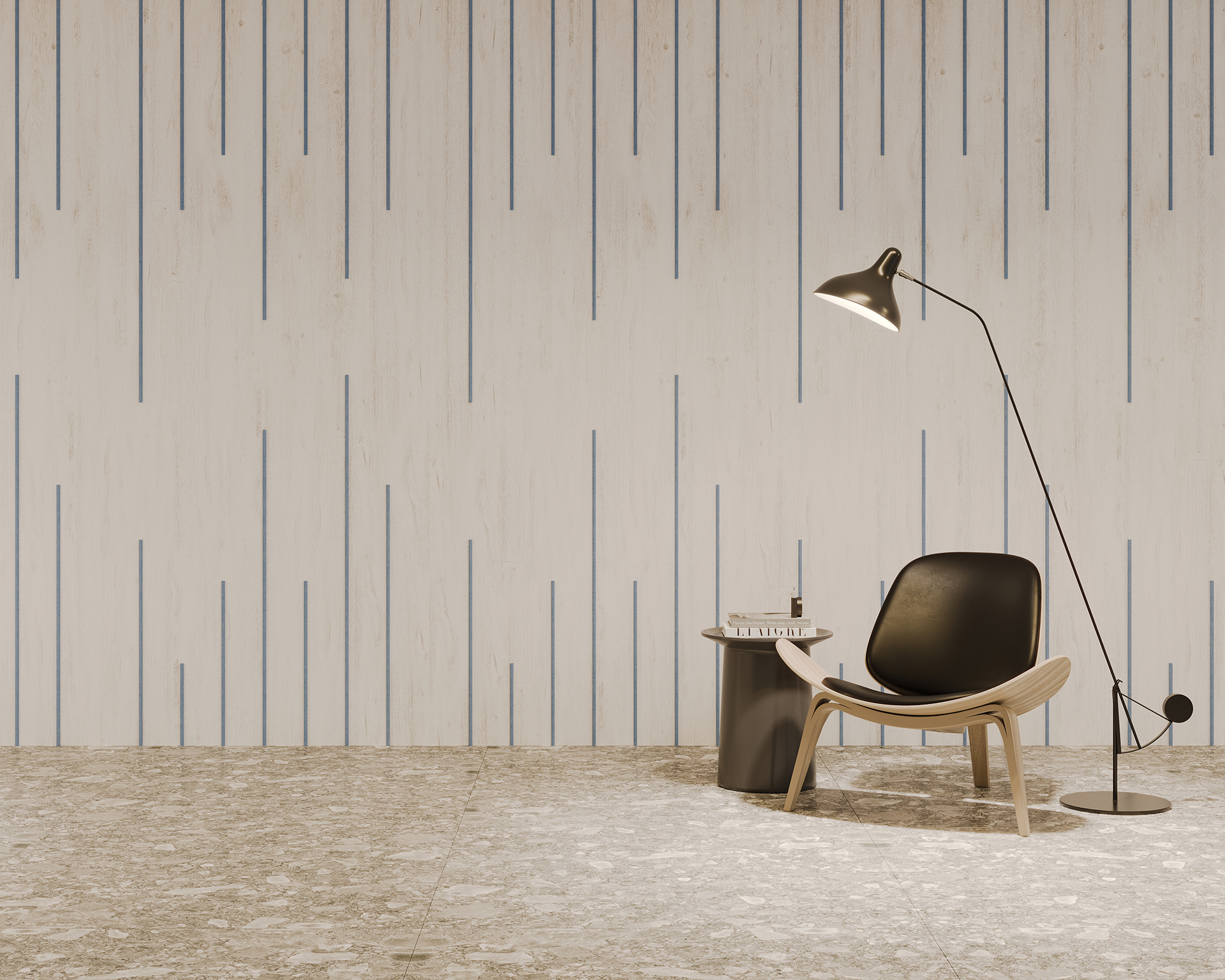 A minimalist room features a modern black chair with a wooden frame next to a small round side table holding books. An arc floor lamp with a large shade stands nearby, all set against a textured acoustic felt wall with vertical lines and a patterned floor.