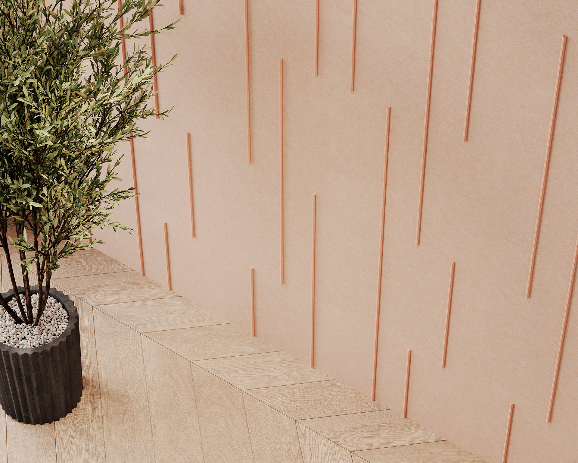 A corner of a room with a textured light pink acoustic felt wall featuring vertical lines. A tall green plant in a dark, ribbed planter sits on a wooden floor with a herringbone pattern.