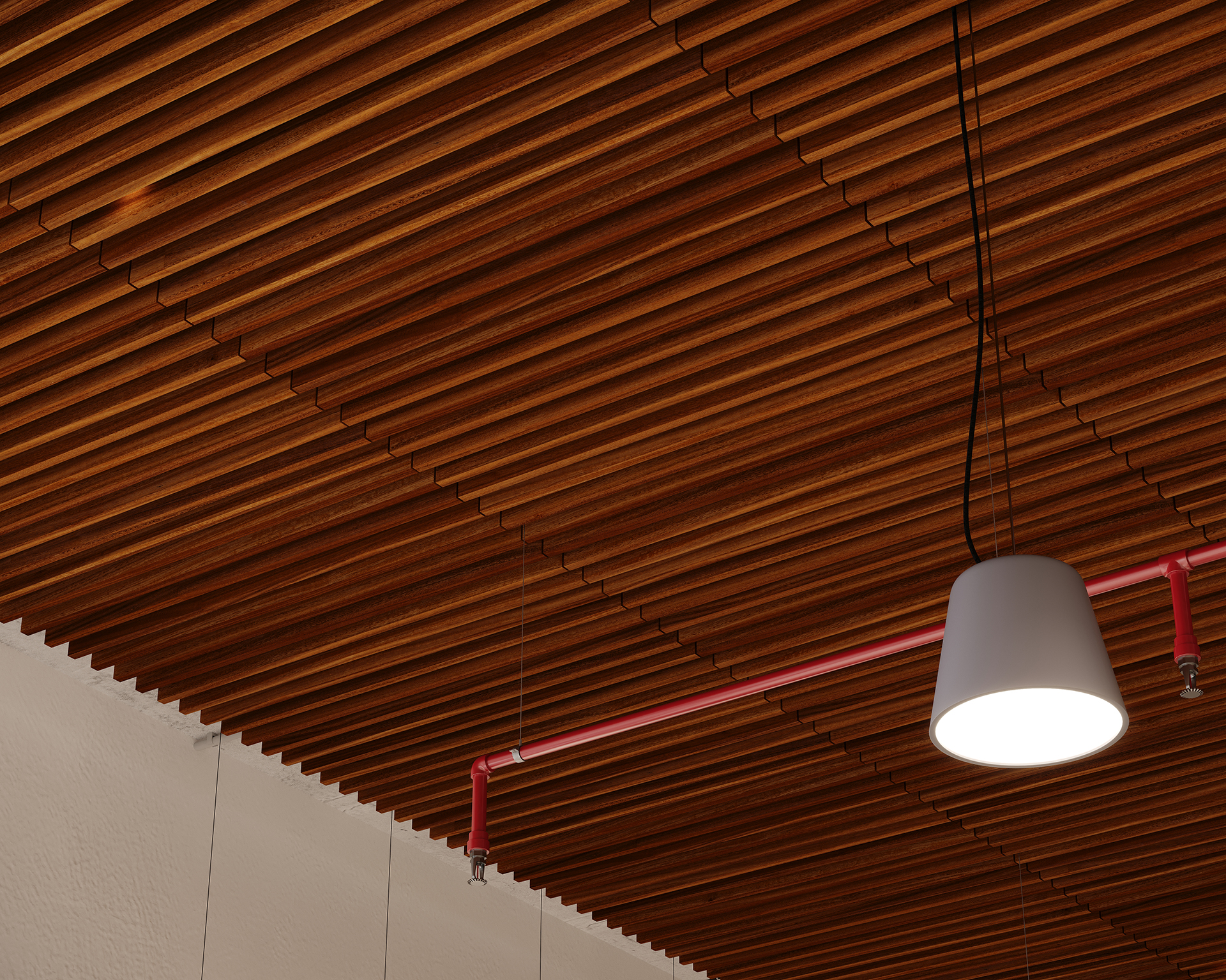 Woodgrain acoustic felt slat ceiling with a modern hanging white light fixture. Red fire sprinkler piping is visible beside the light. The slats create a textured, uniform pattern.