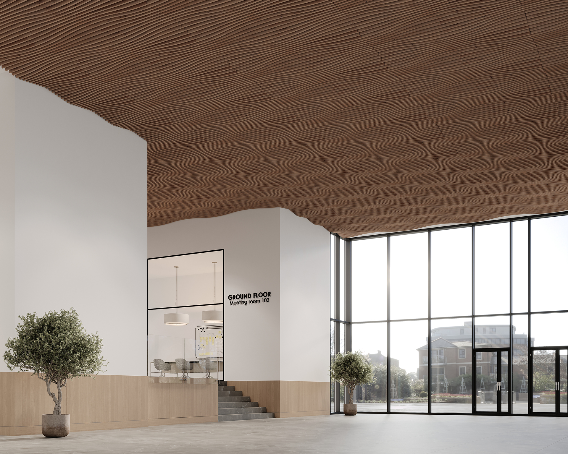 Spacious modern lobby with large glass windows, woodgrain acoustic felt ceiling, and light-colored walls. Two potted trees are near the entrance. A staircase leads to a meeting room labeled "Ground Floor Meeting Room 002.