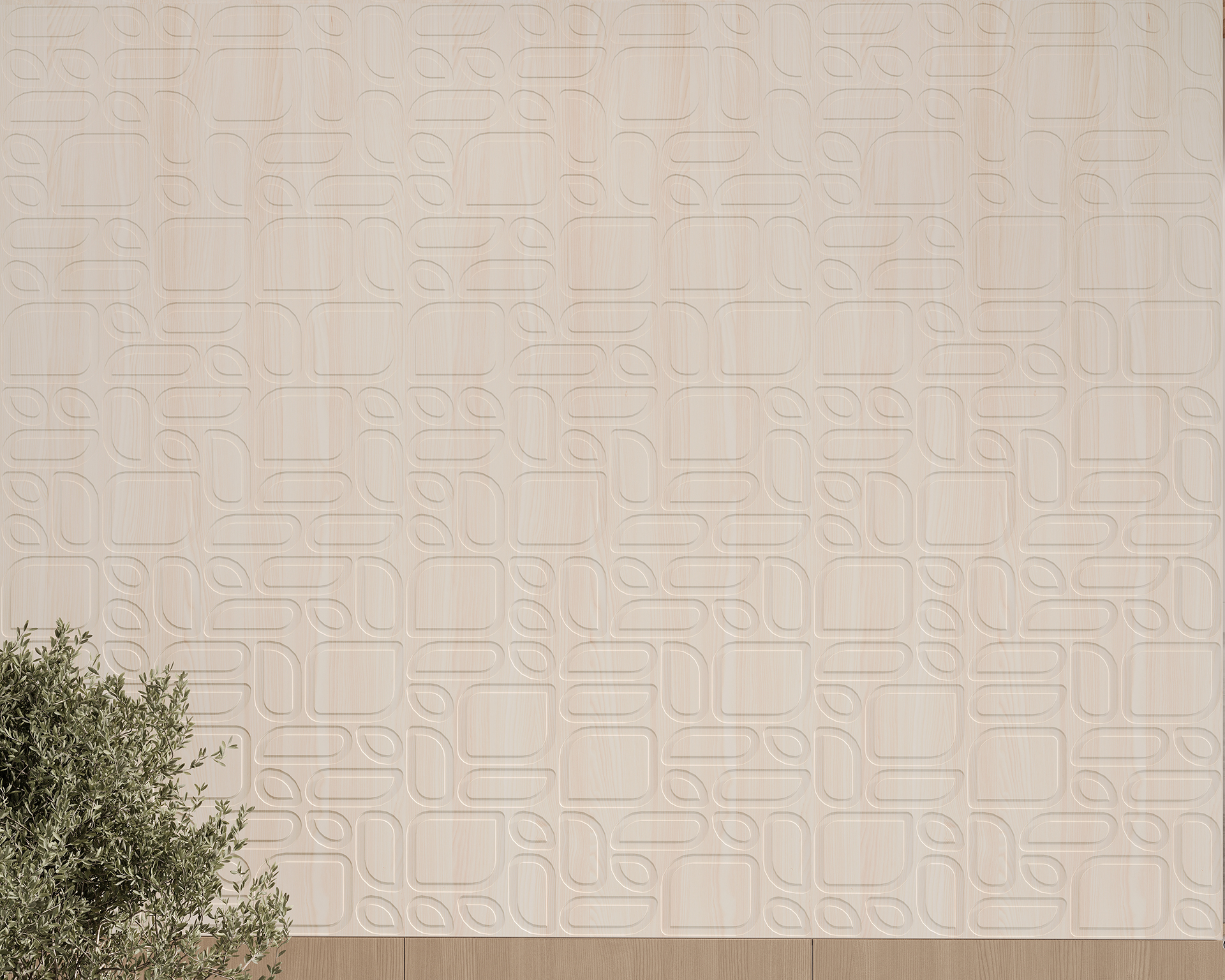 Textured beige acoustic felt wall with a geometric pattern of rounded rectangles and ovals. A lush green plant with small leaves is partially visible in the lower left corner, contrasting with the smooth, uniform surface of the wall.