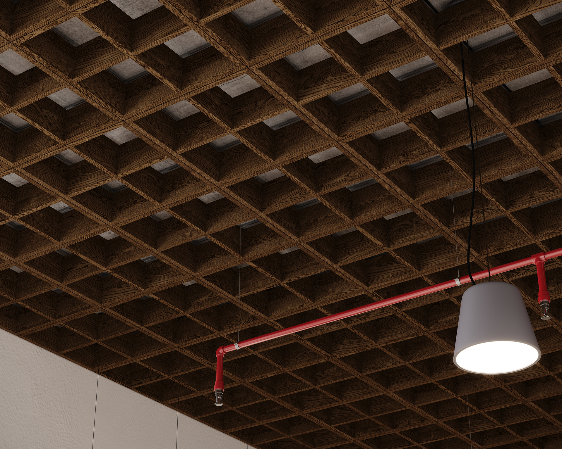 A woodgrain acoustic felt grid ceiling with a red fire sprinkler pipe and a hanging cylindrical white light fixture. The grid structure creates a pattern of square recesses, adding texture to the ceiling design.