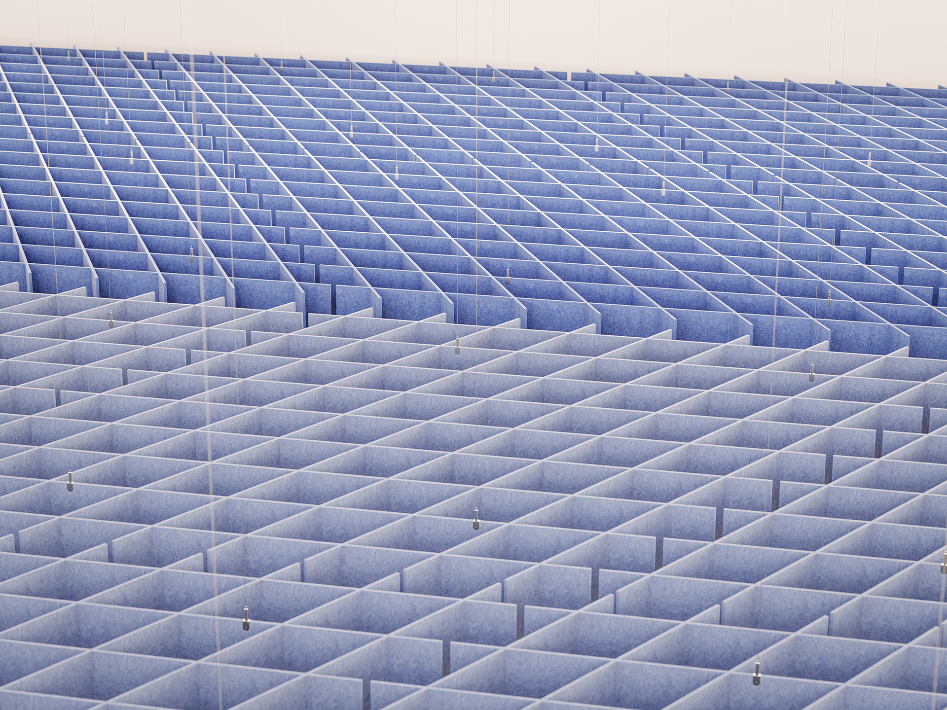 A large grid of blue, rectangular acoustic felt clouds creates a geometric, maze-like pattern; the clouds are evenly spaced, and thin wires hang from the ceiling above.