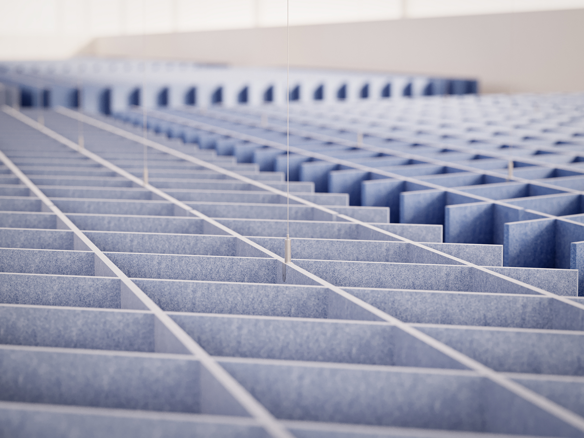 A close-up view of an acoustic felt ceiling cloud with a grid-like structure made of blue panels, arranged in rows and columns, creating a repeating geometric pattern with a modern, abstract appearance.