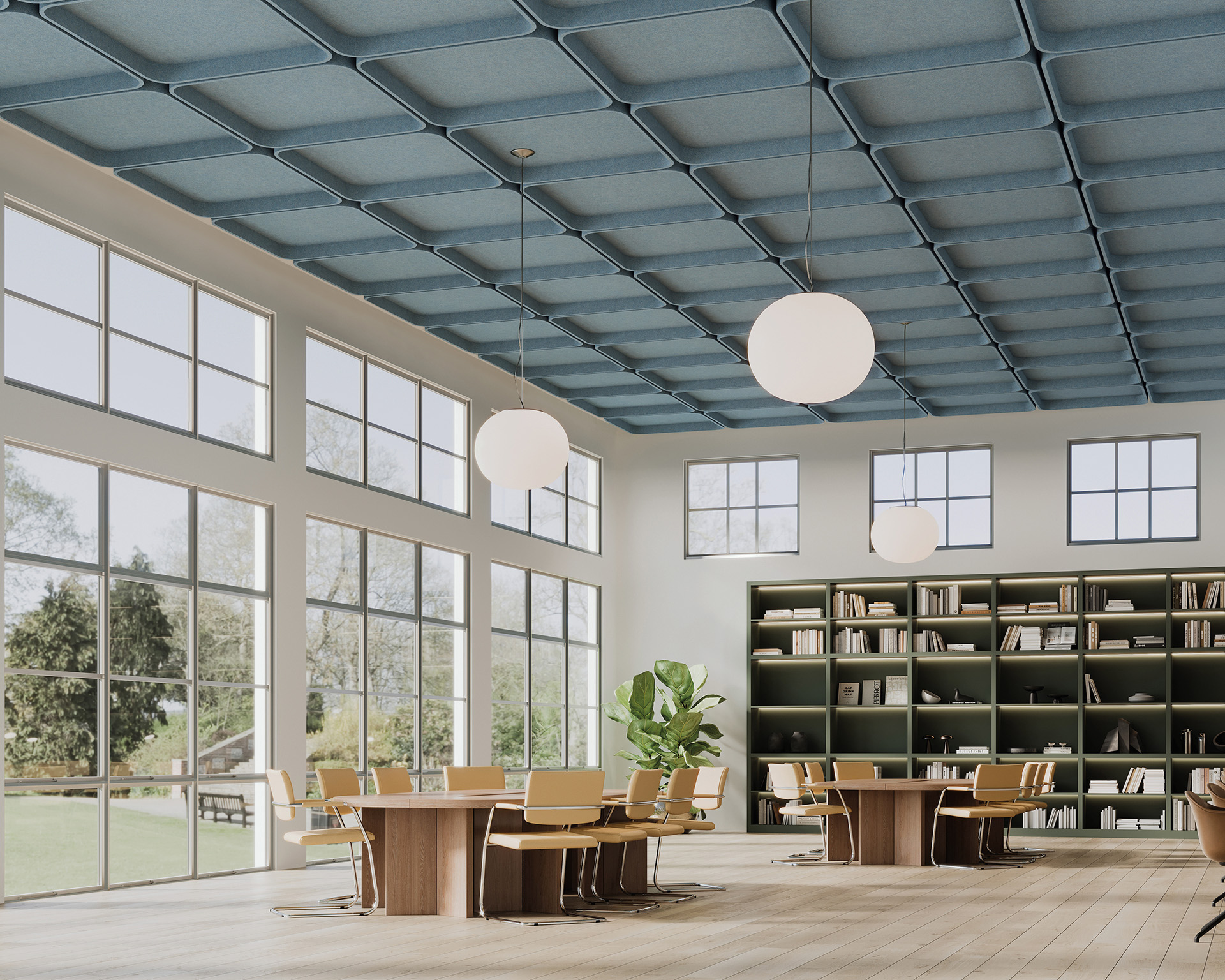 Spacious modern library with large windows and a green wall of bookshelves. Round tables and chairs align the room, and two spherical lamps hang from the textured acoustic felt ceiling. Natural light brightens the interior, with a view of greenery outside.