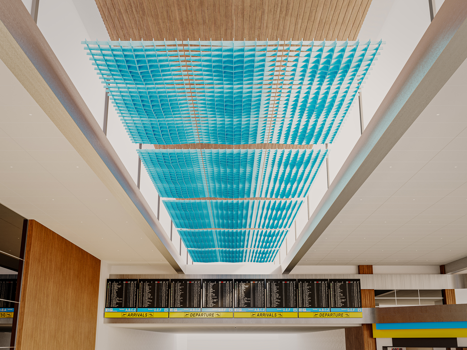 A modern airport interior with a large blue geometric acoustic felt art installation suspended from the ceiling above digital departure and arrival boards. Warm wood panels and white surfaces frame the bright, airy space.
