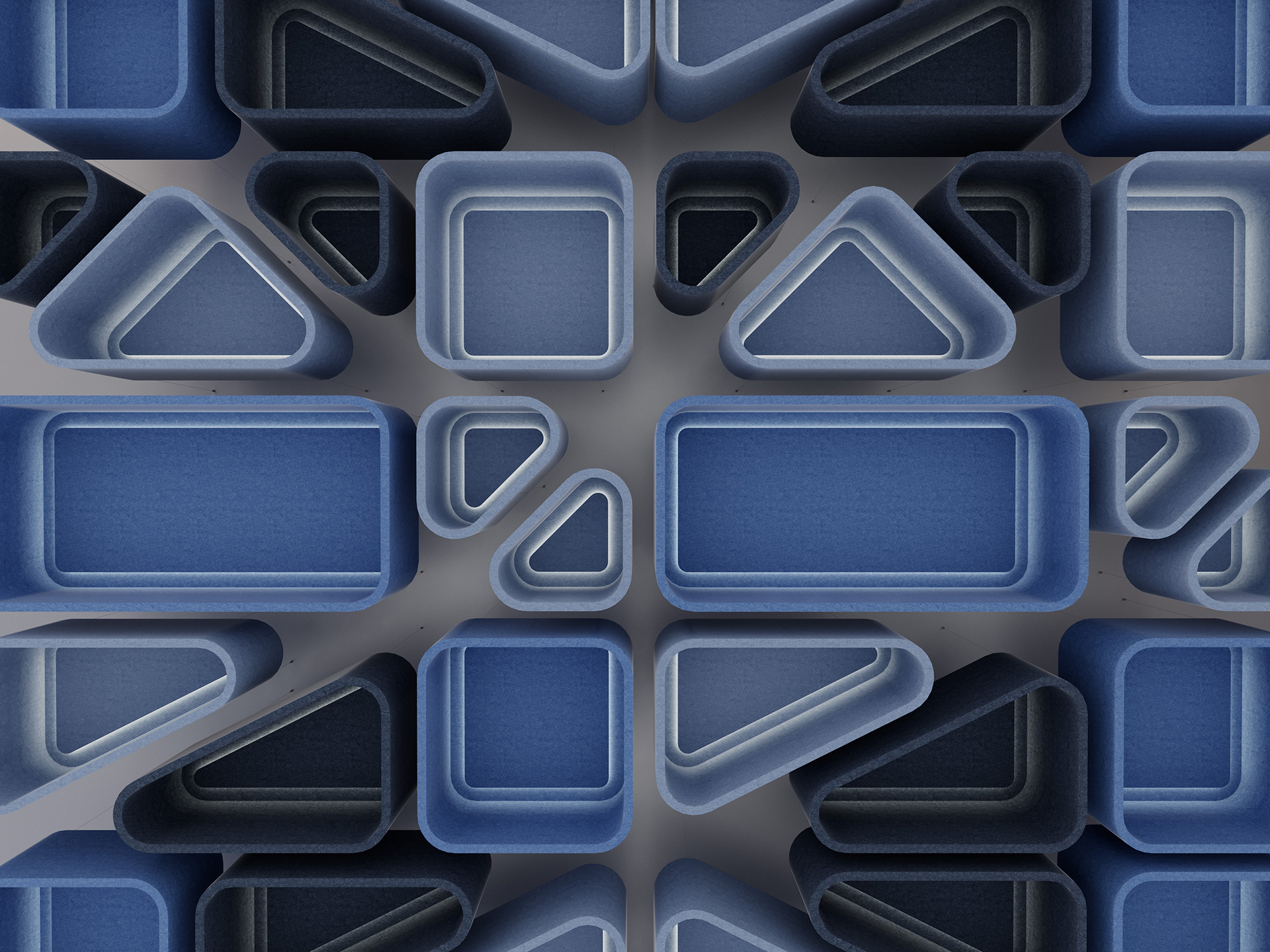 A geometric abstract design featuring blue and gray rectangular and triangular acoustic felt cloud shapes arranged in a symmetrical, layered pattern with varying depths and shadows.