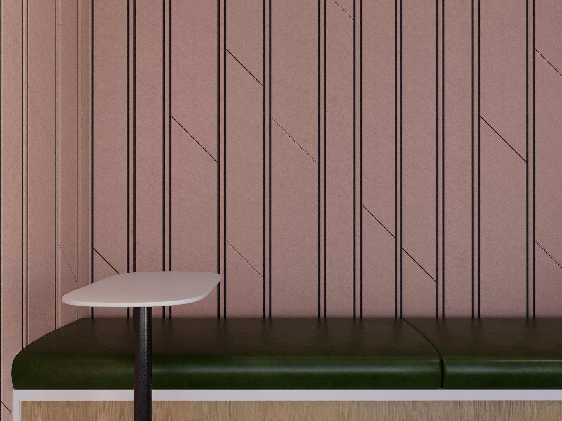 Minimalist seating area with a green cushioned bench, light wooden base, and a small white table. The background features a pink acoustic felt wall with a geometric black line pattern.
