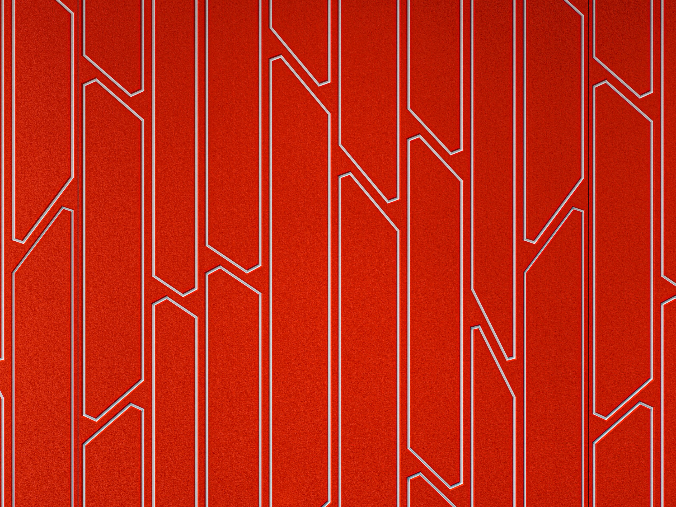 Red geometric acoustic felt pattern featuring elongated, angled shapes outlined in white, arranged in a repeating vertical layout on a textured red background. The design creates a modern, visually dynamic appearance.