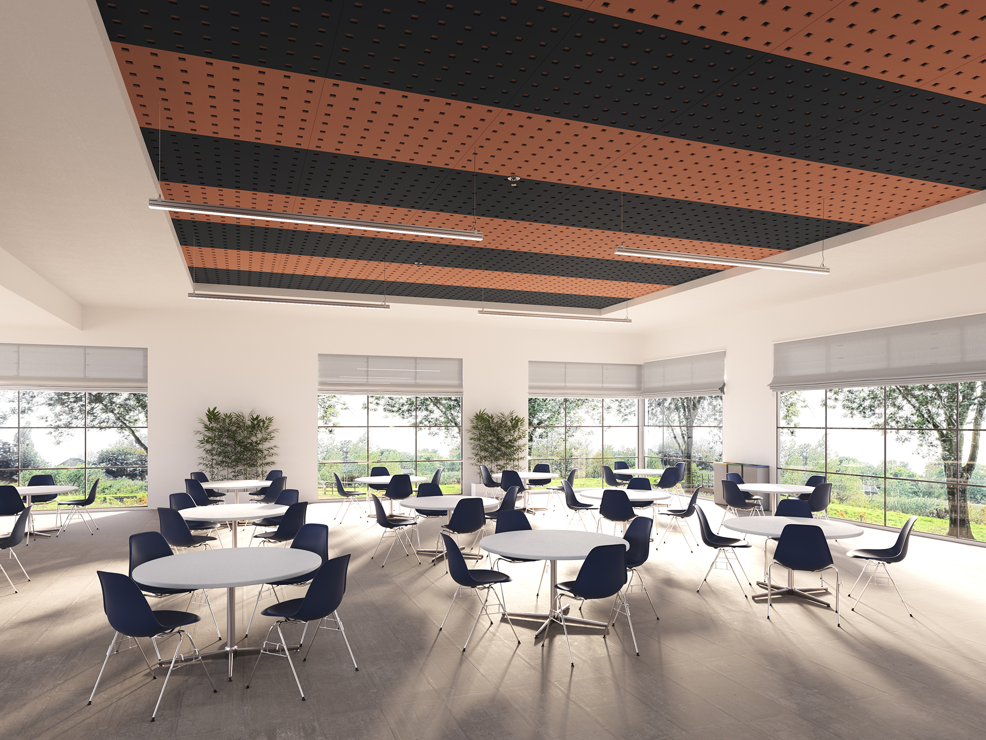 Modern cafeteria with round tables and navy chairs on a light floor, featuring large windows with outdoor views, potted plants, and a ceiling with alternating black and light orange acoustic panels.