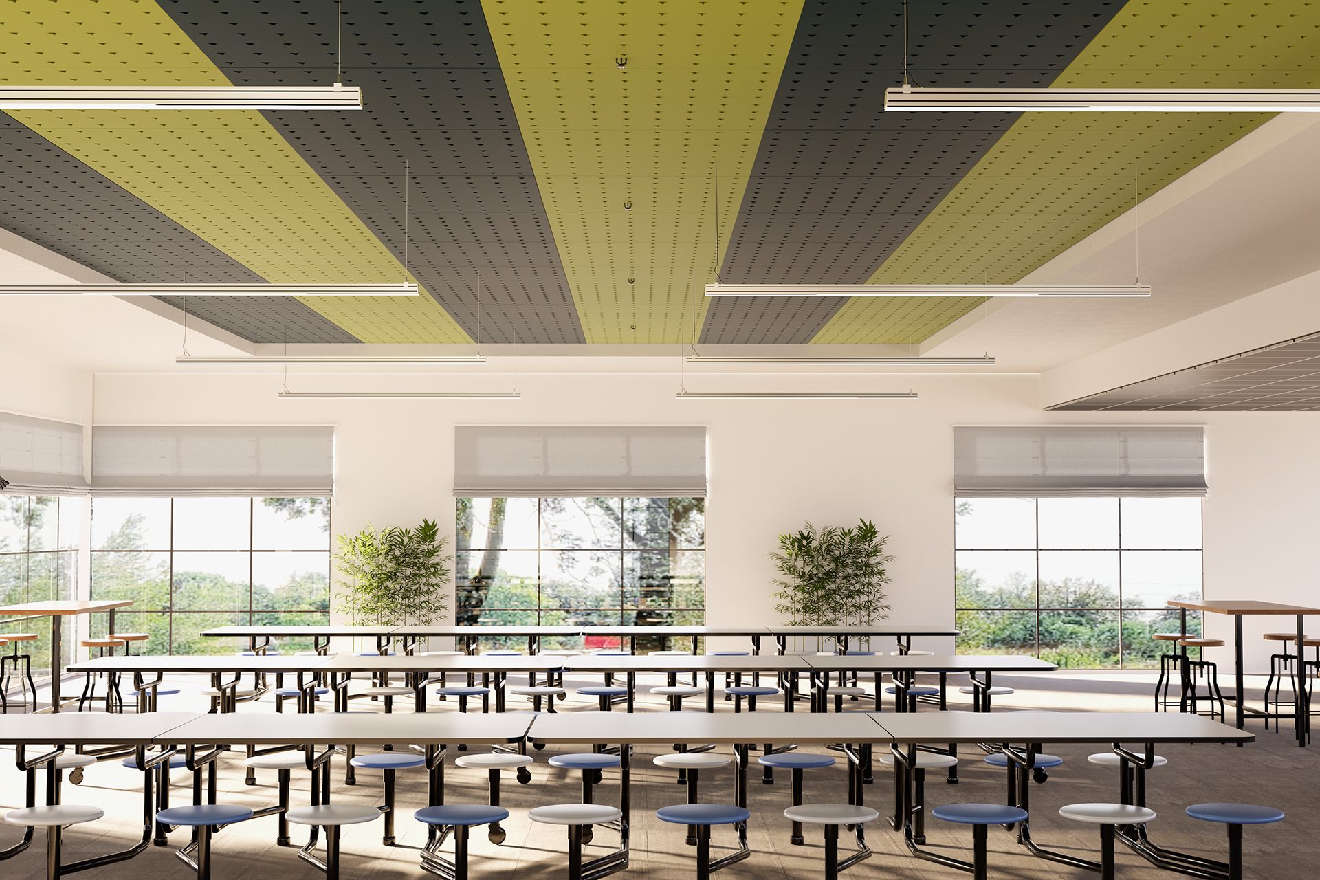 A modern cafeteria with long tables, round blue-and-white stools, large windows with outside views, indoor plants, and a ceiling featuring alternating green and black acoustic felt panels.