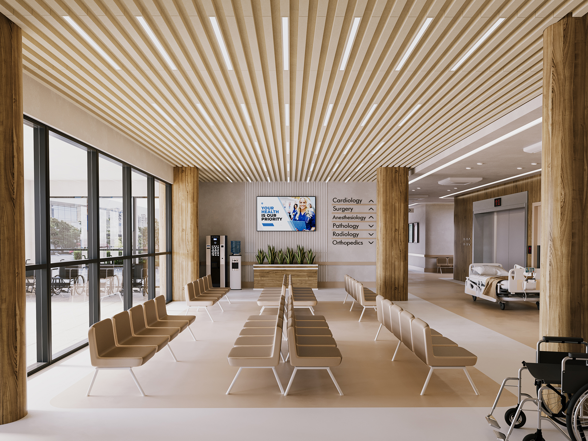 A modern hospital waiting room with beige chairs, wooden accents, acoustic felt ceiling, large windows, and bright lighting. A digital screen and department signs are visible on the wall. Wheelchairs and hospital beds are seen in the background.