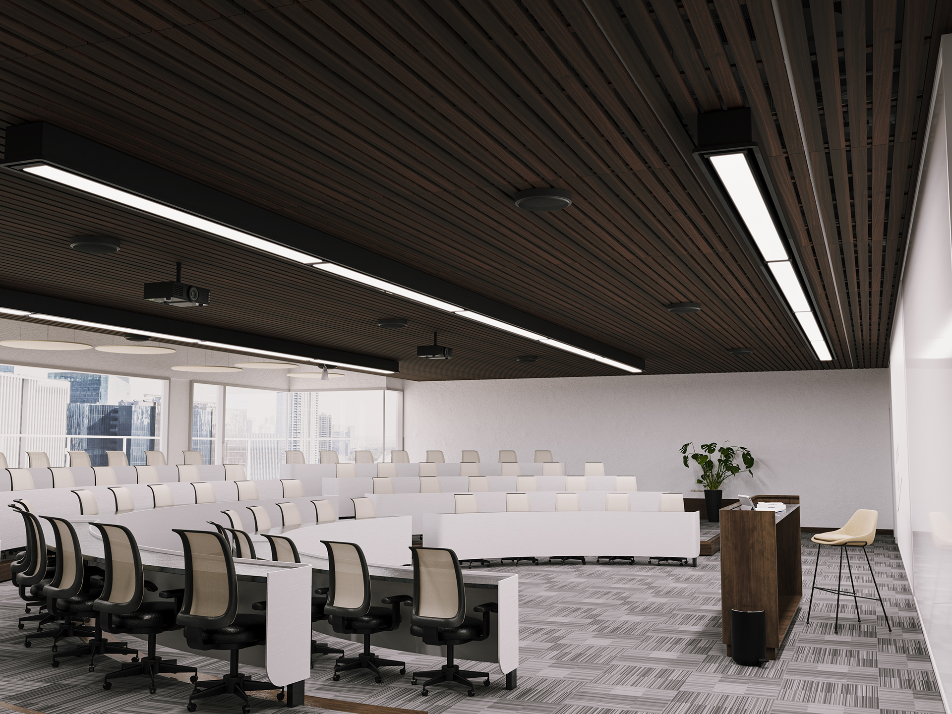 A modern, empty lecture hall with tiered rows of beige chairs and white desks, a wooden podium, large windows showing a cityscape, and a plant in the corner. The ceiling has dark woodgrain acoustic felt slats and long LED lights.