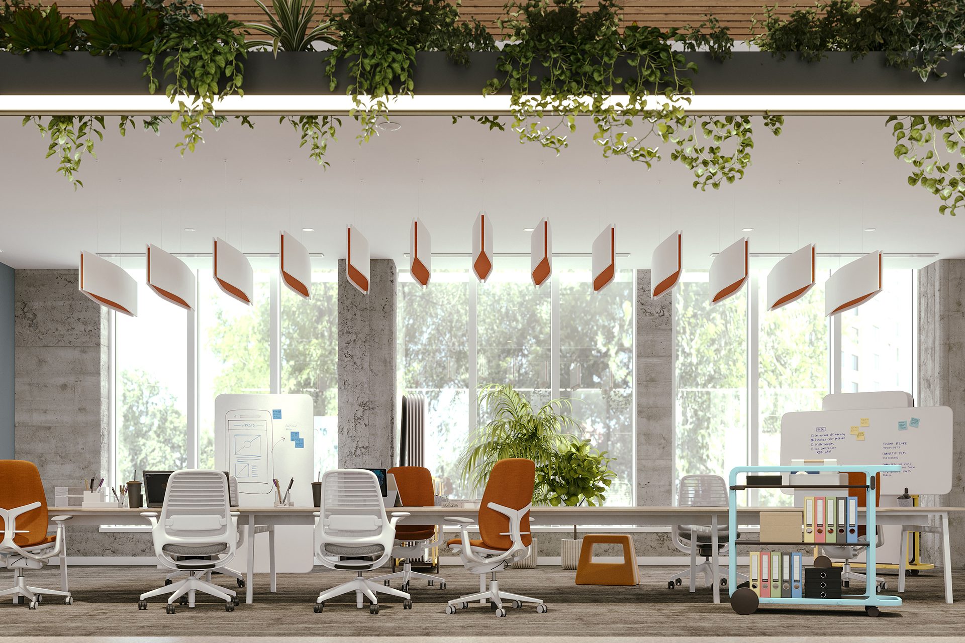 Modern open office space with white desks and chairs, acoustic felt ceiling baffles, orange accents, large windows, green plants, ceiling lights, and whiteboards; natural light streams in, creating a bright, inviting atmosphere.