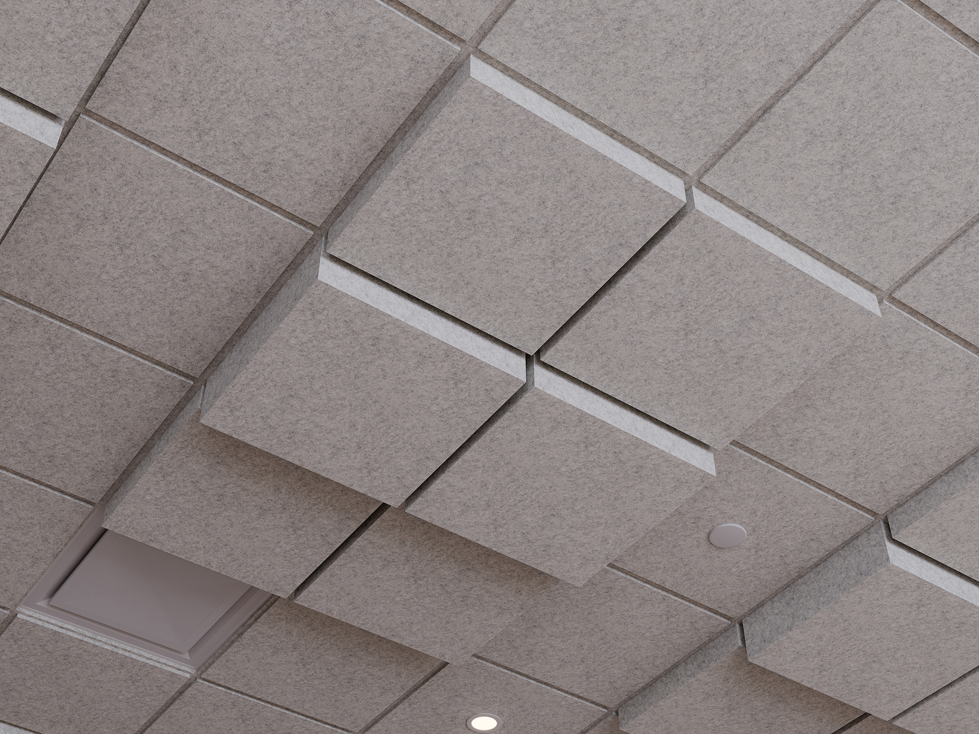 Ceiling with gray acoustic felt panels arranged in a geometric pattern, featuring some raised rectangular sections, recessed lighting, and a ventilation vent.