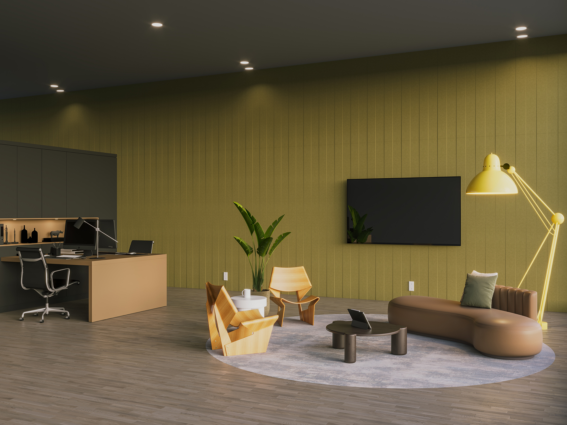 Modern office lounge with a brown sofa, yellow floor lamp, wooden chairs, a round rug, plants, and a wall-mounted TV on an acoustic felt wall panel. An executive desk with a laptop is in the corner, and the space has wood flooring and recessed lighting.