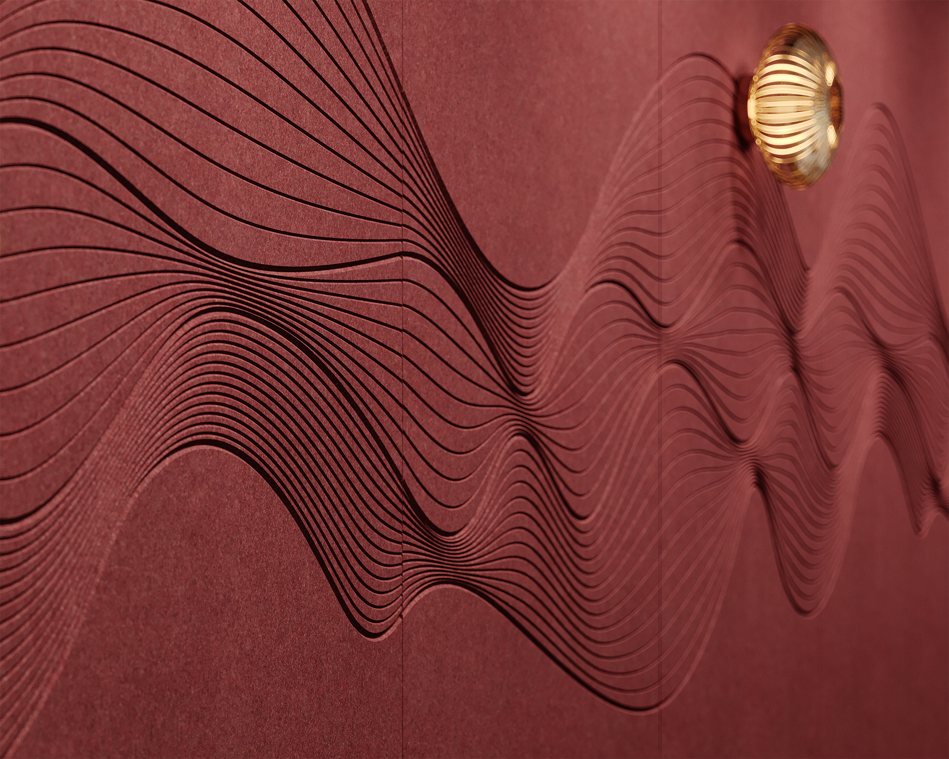 A textured acoustic felt wall with wavy, raised lines creating an abstract pattern; a round, gold decorative element is attached to the wall on the right side.