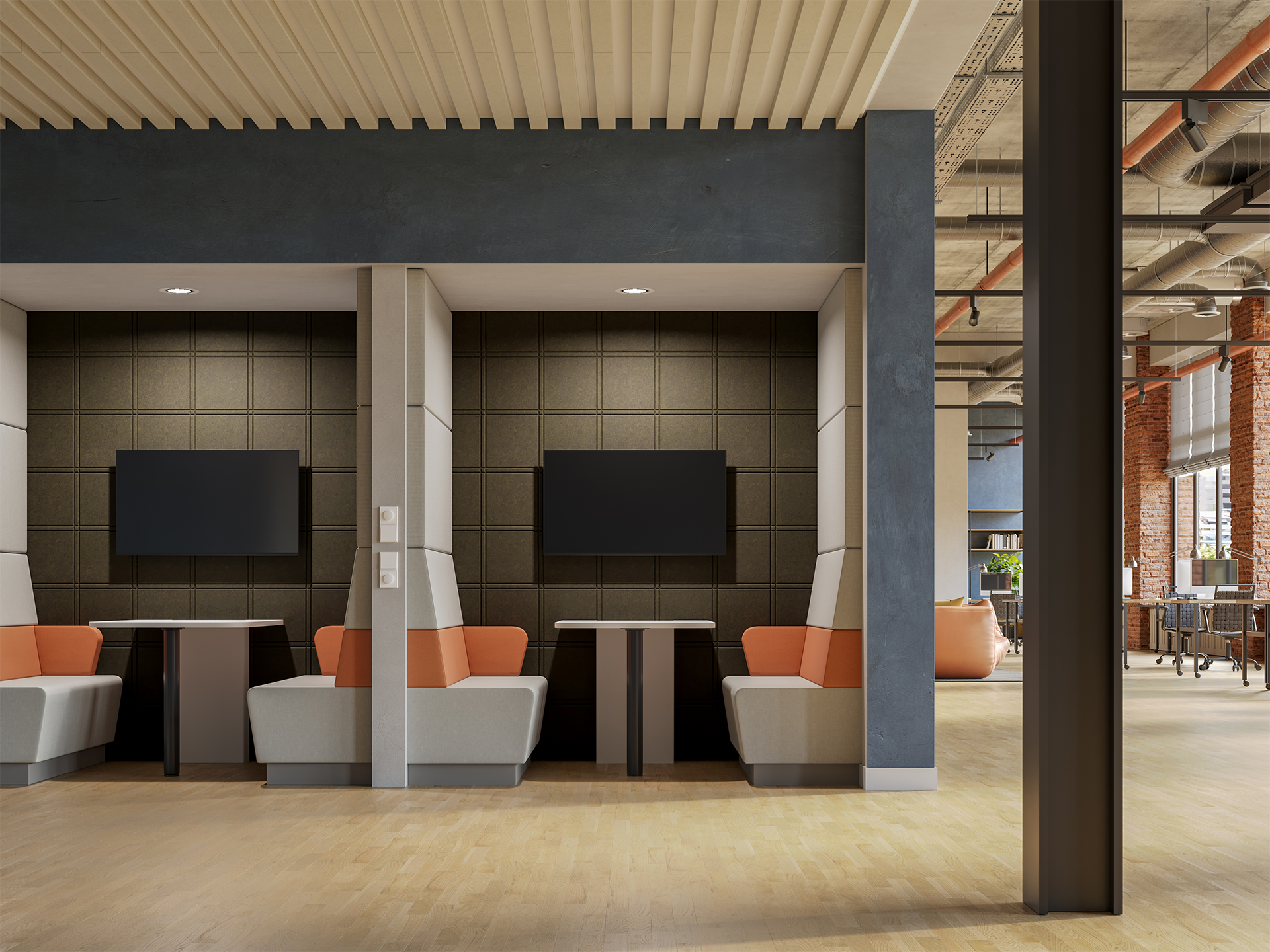 Modern office space with two booth seating areas, each featuring a wall-mounted TV, gray and orange cushioned seats, small tables, acoustic felt walls, and an open workspace visible in the background with large windows and exposed ceilings.